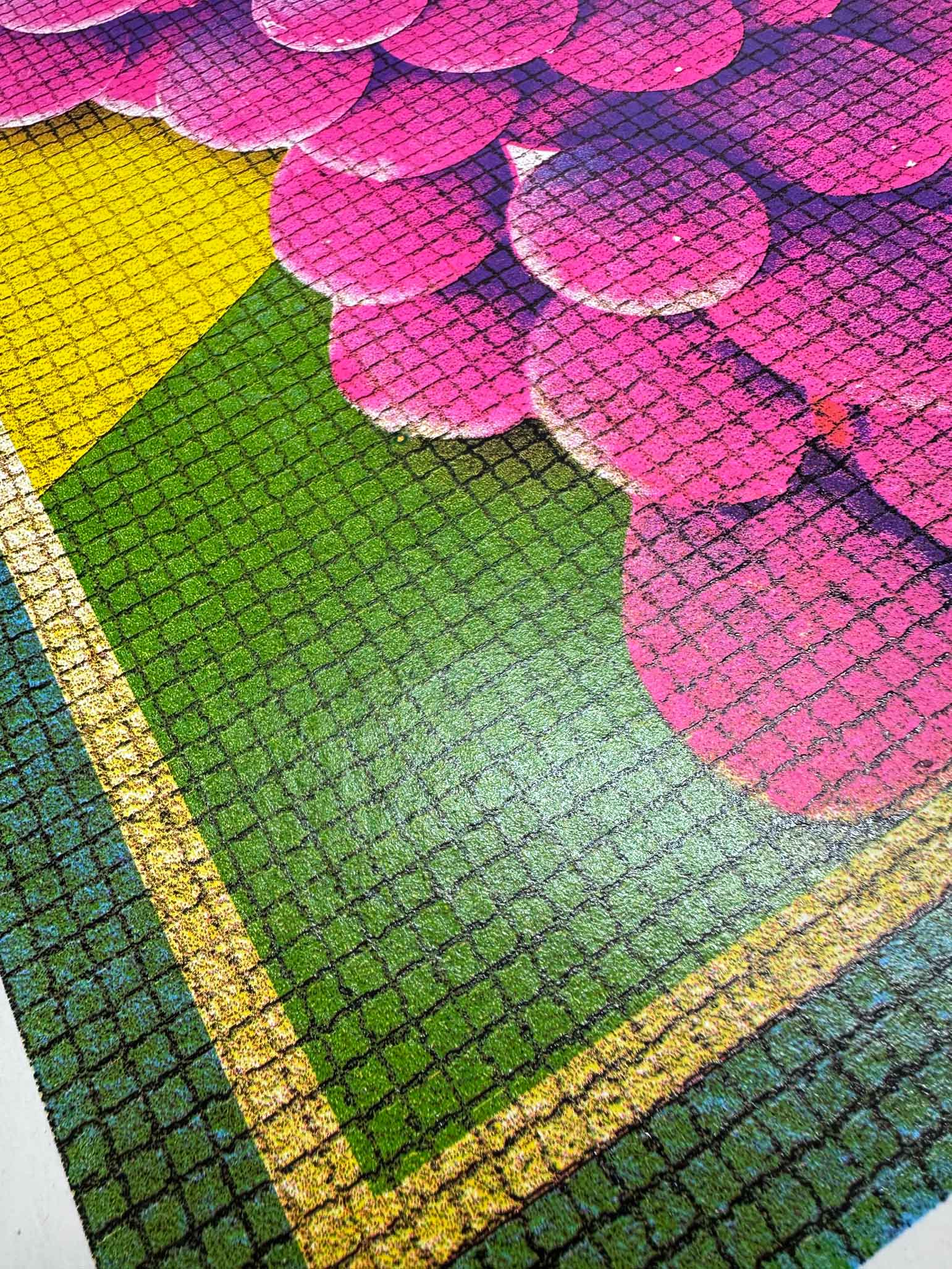 Close-up of a colorful flower pattern on a textured surface