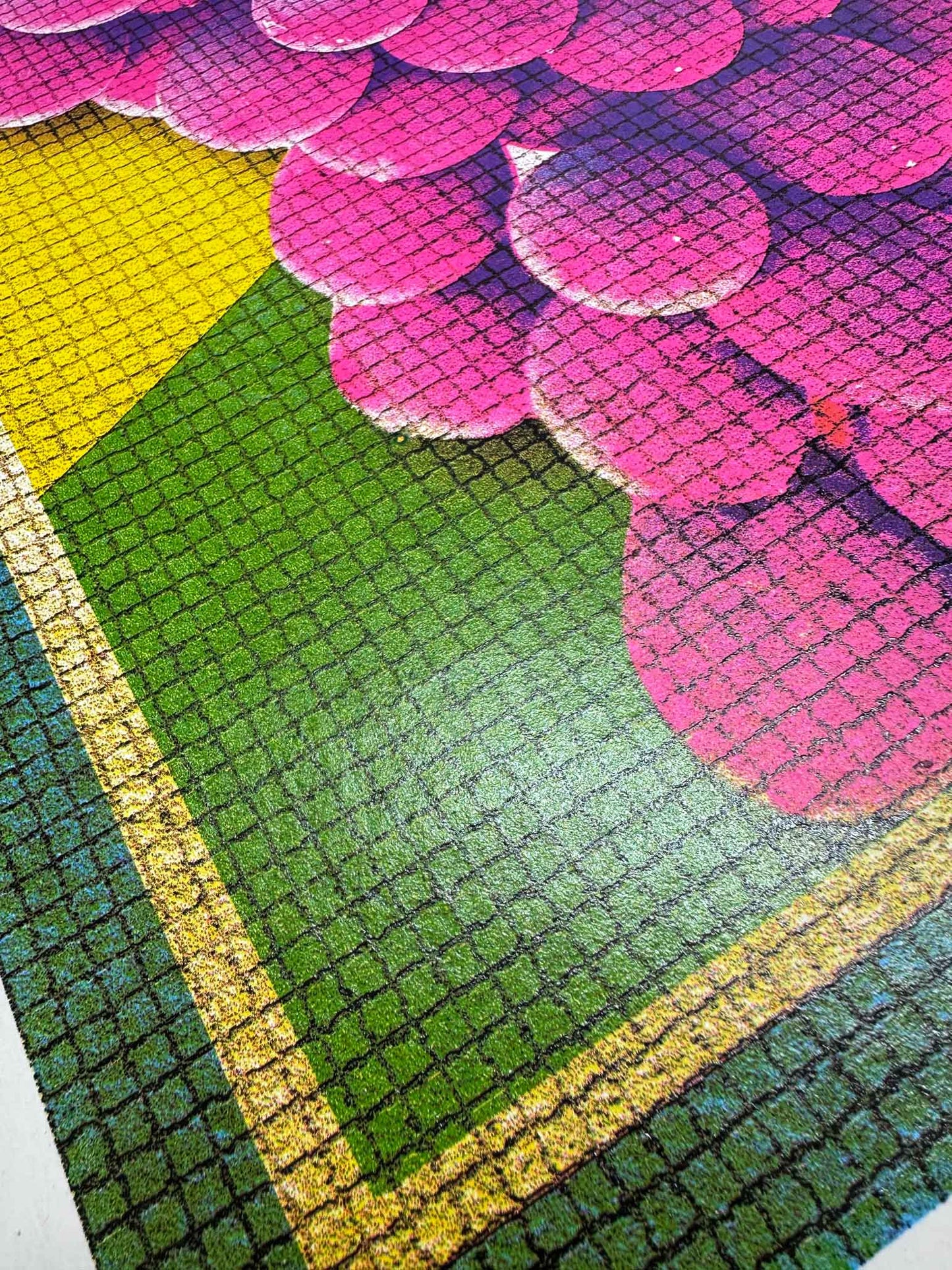 Close-up of a colorful flower pattern on a textured surface