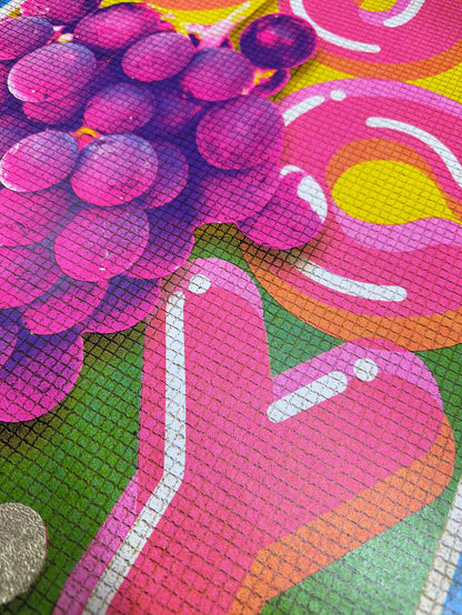 Colorful mosaic artwork with pink flamingo and purple grapes on a multicolored background